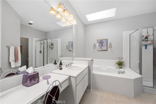 40310 Via Tonada, Murrieta, CA 92562 - bathroom with a skylight, a bath, tile patterned flooring, and a stall shower