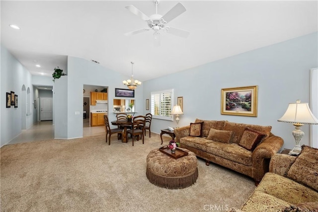 40310 Via Tonada, Murrieta, CA 92562 - living room featuring recessed lighting, vaulted ceiling, baseboards, light colored carpet, and ceiling fan with notable chandelier