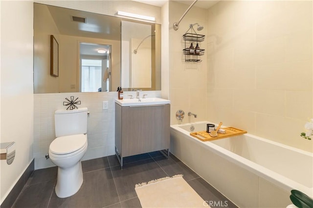 full bath with visible vents, bathing tub / shower combination, toilet, and vanity
