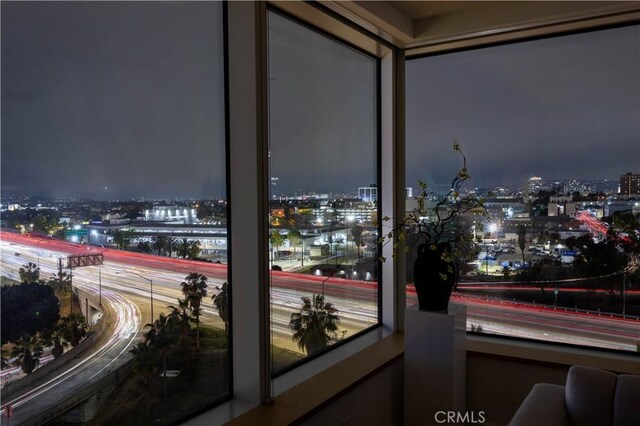 balcony at night with a view of city lights