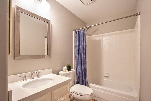 bathroom featuring shower / bath combo with shower curtain, vanity, and toilet
