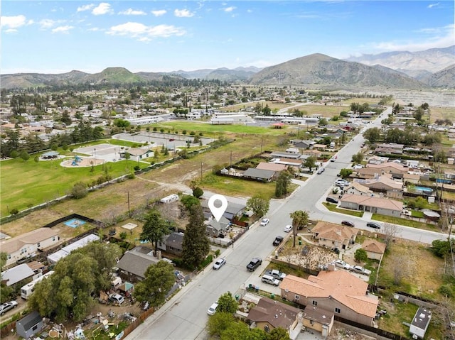 birds eye view of property featuring a residential view and a mountain view