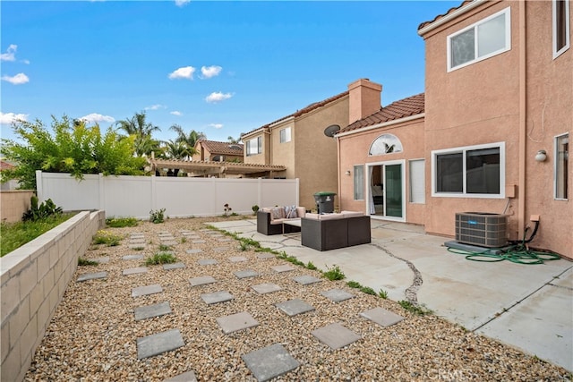view of patio / terrace with a fenced backyard, an outdoor hangout area, and cooling unit