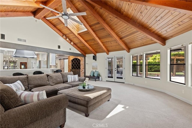 living room featuring visible vents, light colored carpet, beamed ceiling, ceiling fan, and wood ceiling
