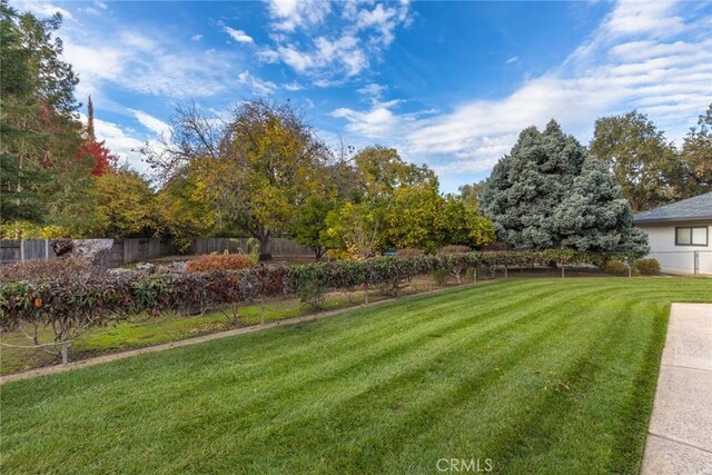 view of yard featuring fence