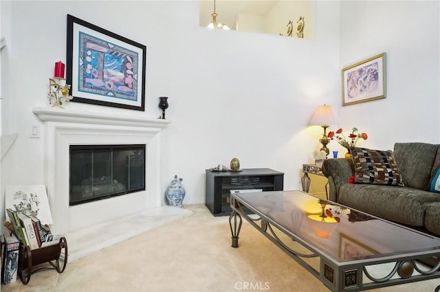 763 W 1st St Unit 80, Claremont, CA 91711 - carpeted living area featuring a glass covered fireplace