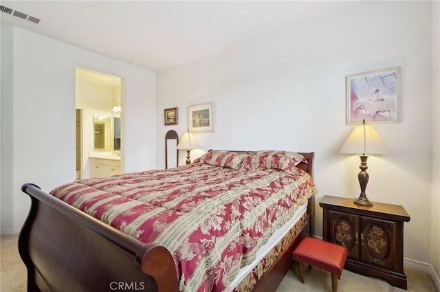 763 W 1st St Unit 80, Claremont, CA 91711 - carpeted bedroom featuring connected bathroom, baseboards, and visible vents