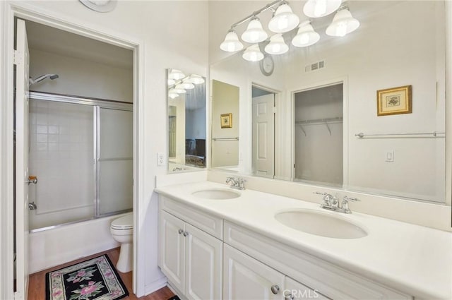 763 W 1st St Unit 80, Claremont, CA 91711 - full bathroom with double vanity, visible vents, toilet, and a sink