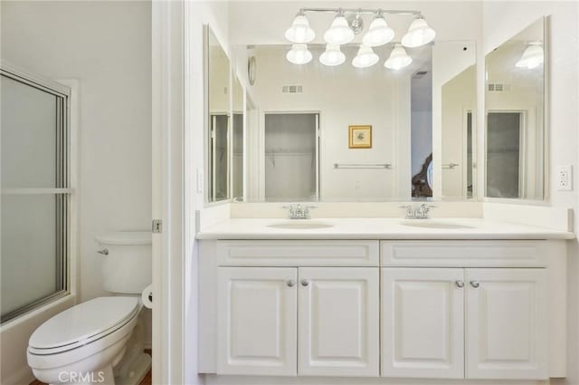 763 W 1st St Unit 80, Claremont, CA 91711 - bathroom featuring toilet, a sink, visible vents, and double vanity