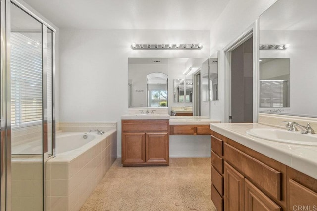 1450 Oakpoint Ave, Chula Vista, CA 91913 - bathroom featuring two vanities, a garden tub, and a shower stall