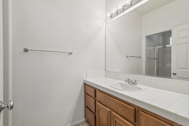 1450 Oakpoint Ave, Chula Vista, CA 91913 - full bathroom featuring vanity and an enclosed shower