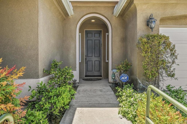 1450 Oakpoint Ave, Chula Vista, CA 91913 - entrance to property featuring stucco siding and a garage