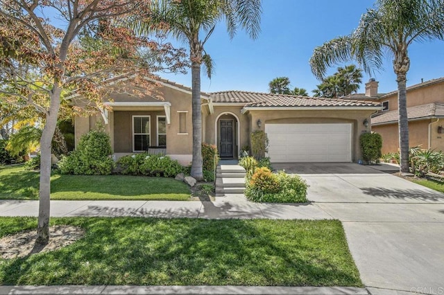 1450 Oakpoint Ave, Chula Vista, CA 91913 - mediterranean / spanish house with an attached garage, driveway, stucco siding, a front yard, and a tiled roof