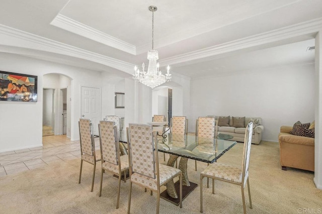 1450 Oakpoint Ave, Chula Vista, CA 91913 - dining room featuring arched walkways, ornamental molding, a chandelier, light carpet, and light tile patterned floors