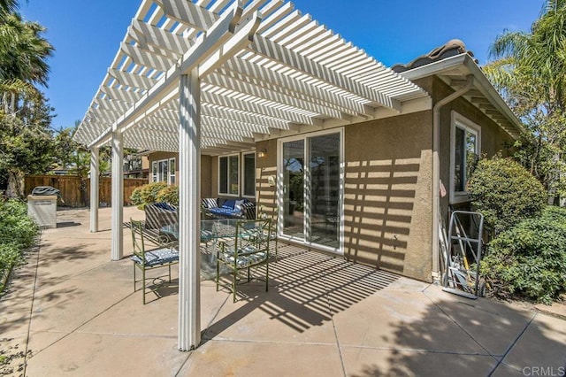 1450 Oakpoint Ave, Chula Vista, CA 91913 - view of patio featuring a pergola and outdoor dining space