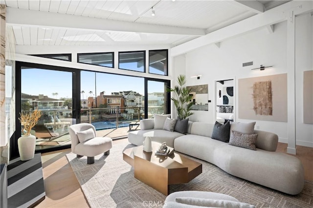 4017 Channel Pl, Newport Beach, CA 92663 - living area with visible vents, wooden ceiling, and vaulted ceiling with beams