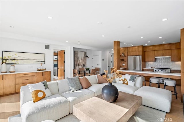 4017 Channel Pl, Newport Beach, CA 92663 - living room with light wood-style floors, visible vents, and recessed lighting