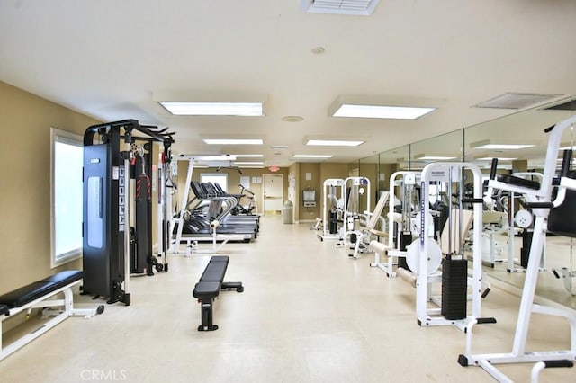 gym featuring visible vents
