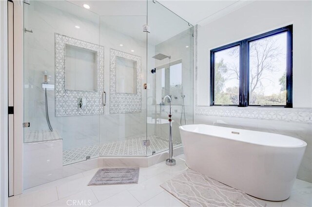 1852 6th St, Manhattan Beach, CA 90266 - full bath with a stall shower, a freestanding bath, tile patterned flooring, and tile walls