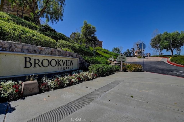 view of community sign