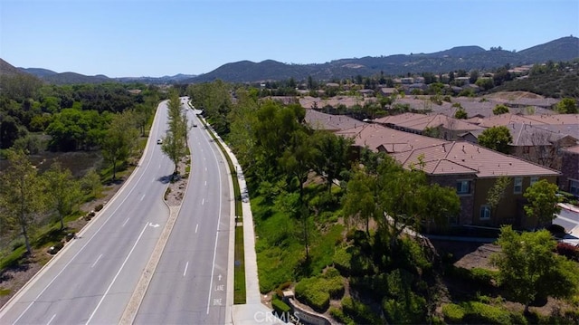 drone / aerial view featuring a mountain view