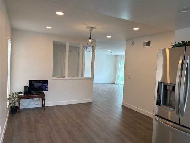 interior space featuring recessed lighting, visible vents, baseboards, and dark wood-type flooring