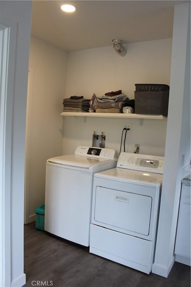 laundry area with independent washer and dryer, recessed lighting, laundry area, and dark wood finished floors