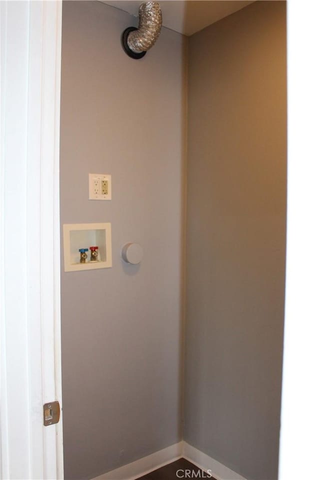 laundry area with hookup for a washing machine and laundry area