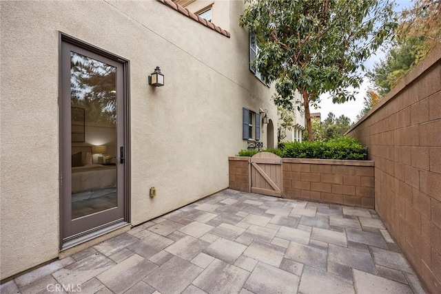 view of patio / terrace featuring a gate