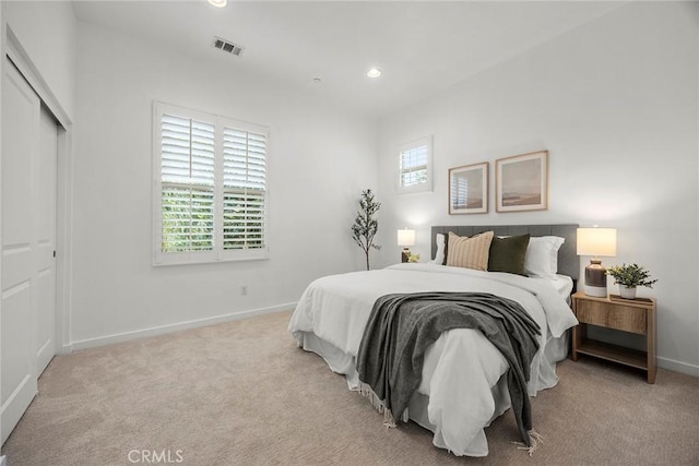 130 Borrego, Irvine, CA 92618 - bedroom with multiple windows, light colored carpet, and recessed lighting