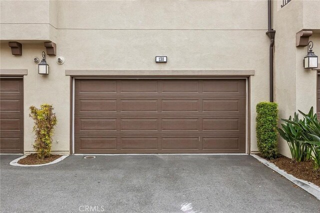 130 Borrego, Irvine, CA 92618 - garage featuring driveway