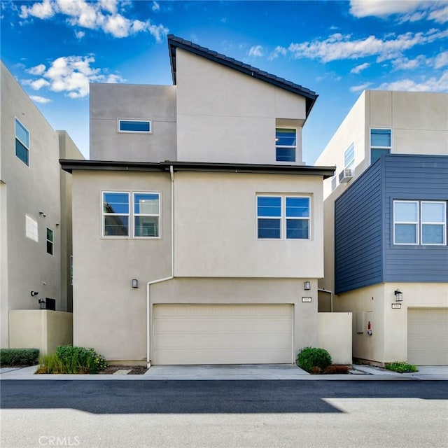102 Pattern, Irvine, CA 92618 - contemporary home with a garage and stucco siding