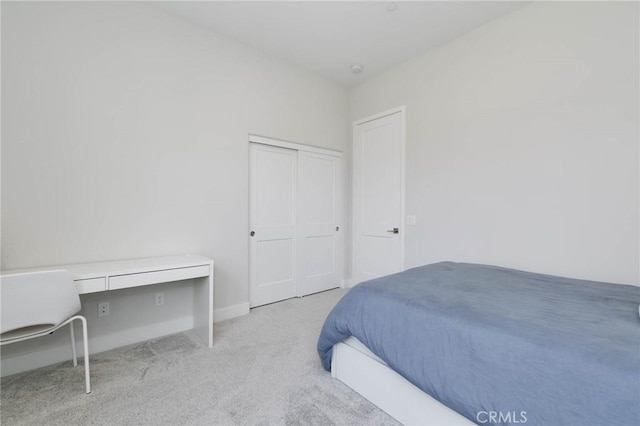 102 Pattern, Irvine, CA 92618 - bedroom with built in desk, baseboards, and carpet flooring