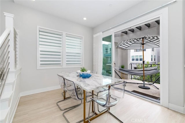 102 Pattern, Irvine, CA 92618 - dining area with wood finished floors, baseboards, and recessed lighting