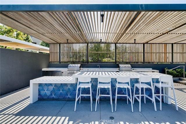 102 Pattern, Irvine, CA 92618 - view of patio / terrace featuring a grill, outdoor wet bar, exterior kitchen, and a sink