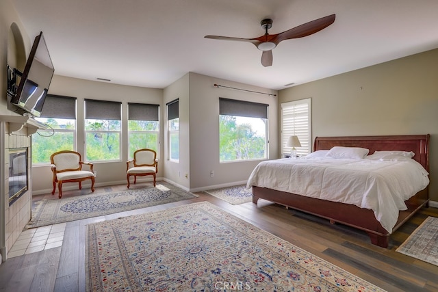 44 Water Lily Way, Coto De Caza, CA 92679 - bedroom featuring baseboards, wood finished floors, ceiling fan, and multiple windows