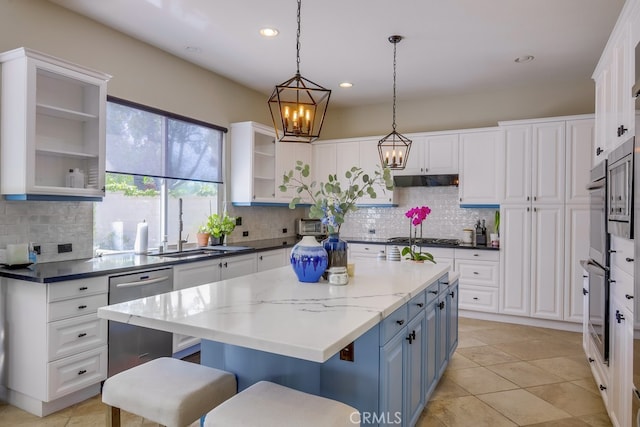 44 Water Lily Way, Coto De Caza, CA 92679 - kitchen with blue cabinets, white cabinets, and stainless steel dishwasher