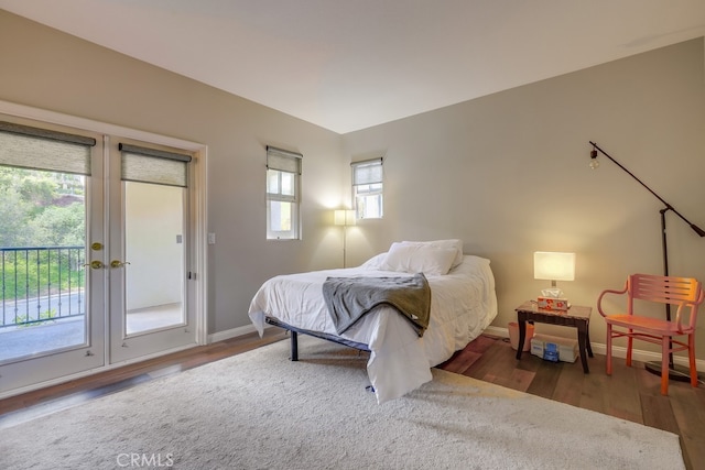 44 Water Lily Way, Coto De Caza, CA 92679 - bedroom with baseboards, access to outside, french doors, and wood finished floors