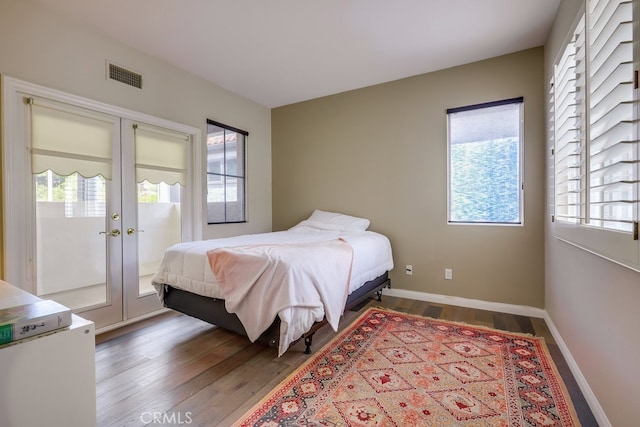44 Water Lily Way, Coto De Caza, CA 92679 - bedroom with wood finished floors, baseboards, french doors, and visible vents