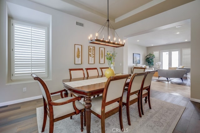 44 Water Lily Way, Coto De Caza, CA 92679 - dining space featuring recessed lighting, an inviting chandelier, wood finished floors, visible vents, and baseboards