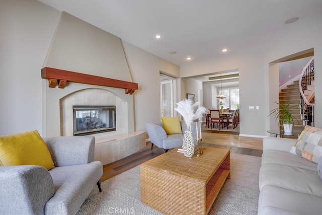 44 Water Lily Way, Coto De Caza, CA 92679 - living room with recessed lighting, baseboards, a fireplace, and stairs