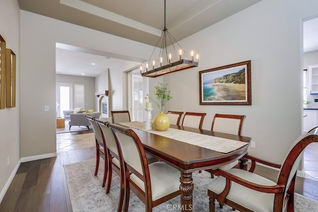44 Water Lily Way, Coto De Caza, CA 92679 - dining area featuring baseboards, a notable chandelier, and hardwood / wood-style floors