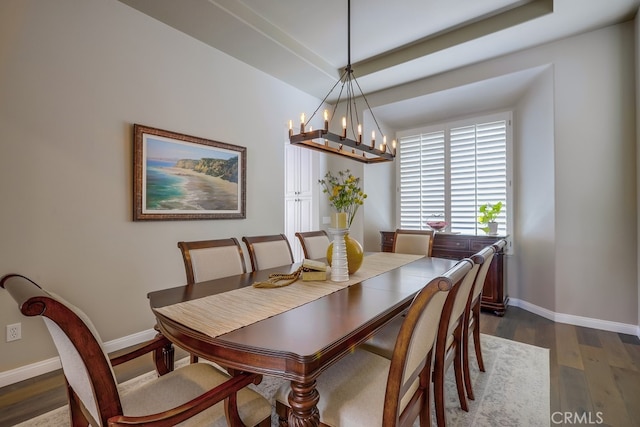 44 Water Lily Way, Coto De Caza, CA 92679 - dining area with dark wood finished floors, baseboards, and a notable chandelier