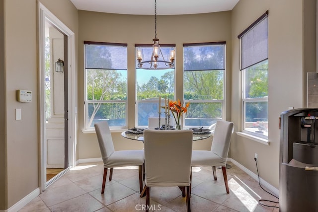 44 Water Lily Way, Coto De Caza, CA 92679 - dining room with baseboards, a wealth of natural light, a chandelier, and light tile patterned floors