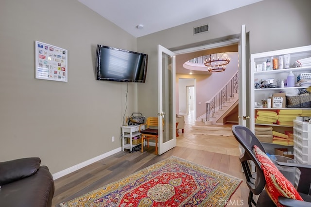 44 Water Lily Way, Coto De Caza, CA 92679 - office space with vaulted ceiling, baseboards, visible vents, an inviting chandelier, and wood finished floors