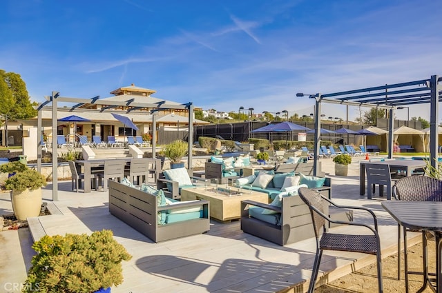 44 Water Lily Way, Coto De Caza, CA 92679 - view of patio featuring a pergola, outdoor dining space, fence, an outdoor living space with a fire pit, and a residential view