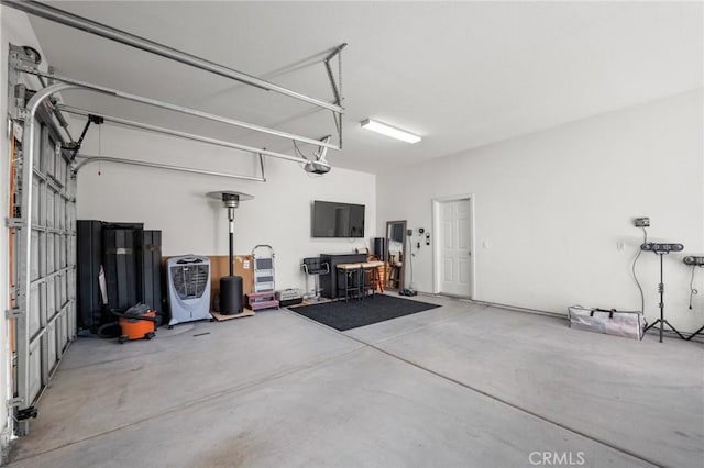7625 Pinon Dr, Yucca Valley, CA 92284 - garage featuring a garage door opener