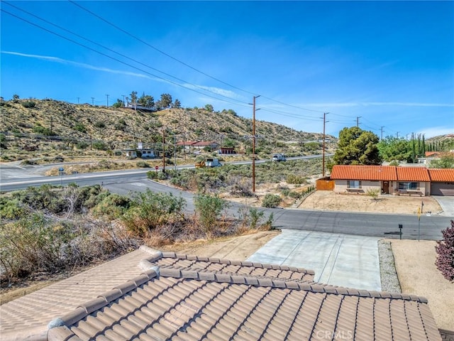 7625 Pinon Dr, Yucca Valley, CA 92284 - view of patio / terrace with a mountain view