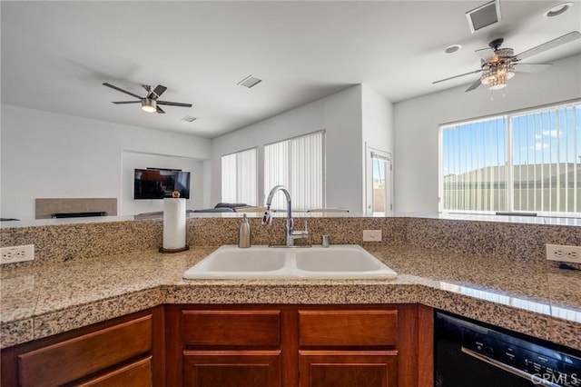 7625 Pinon Dr, Yucca Valley, CA 92284 - kitchen featuring dishwasher, a ceiling fan, tile counters, and healthy amount of natural light