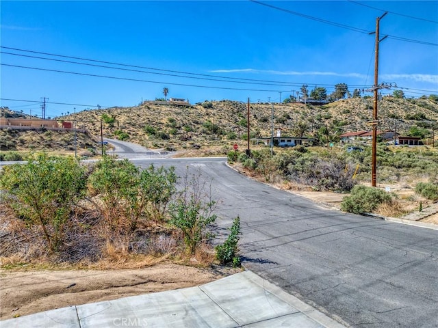 7625 Pinon Dr, Yucca Valley, CA 92284 - view of asphalt road